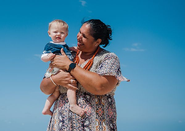 Picture of Caseworker Tash holding Amaya