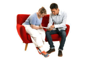 A person explaining a document to someone else.